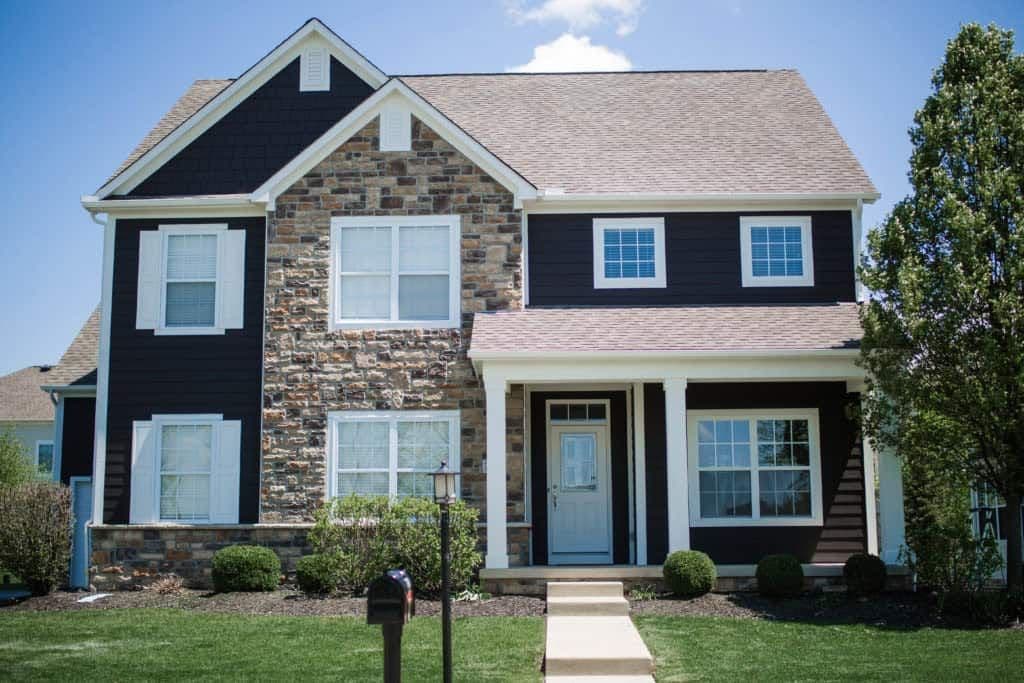 modern-exterior-house-painting-upgrade-dark-gray-siding-white-trim-after-1024x683.jpg